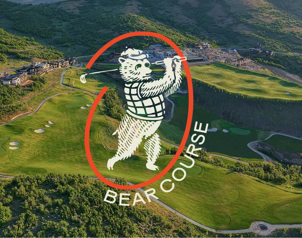 Aerial view of the Bear Course golf layout with Bear Course logo overlay