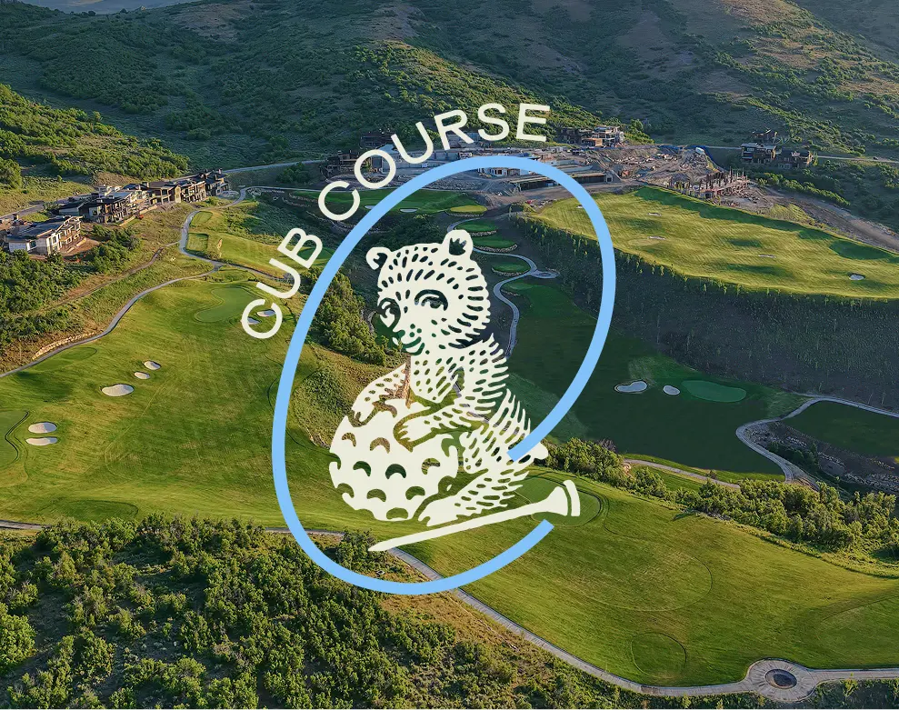Aerial view of the Cub Course golf layout with Cub Course logo overlay