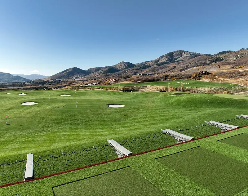 Golf practice range with targets and mountain views at ParOne at SkyRidge