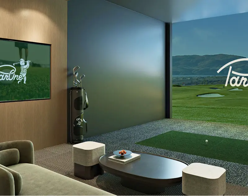 Private indoor golf simulator room with seating and virtual golf course display