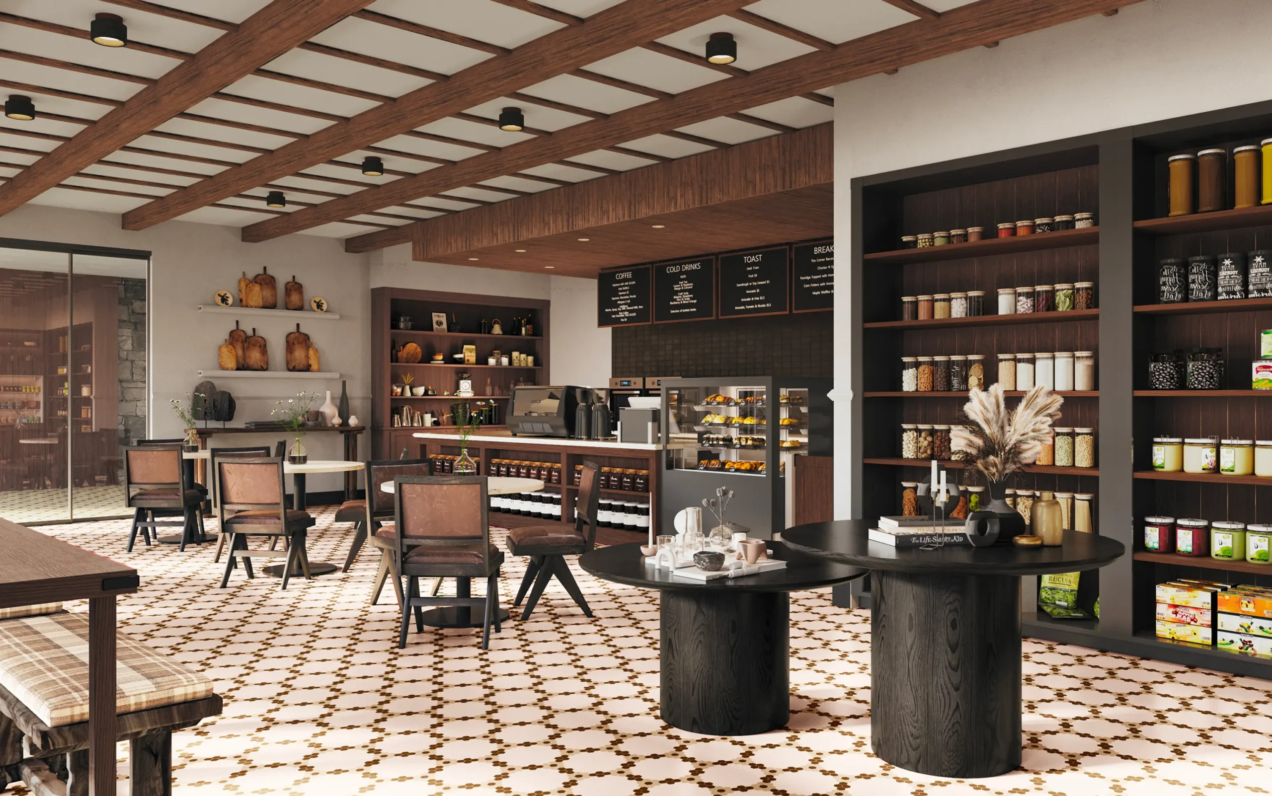 Café and market interior with seating, baked goods, and retail shelves